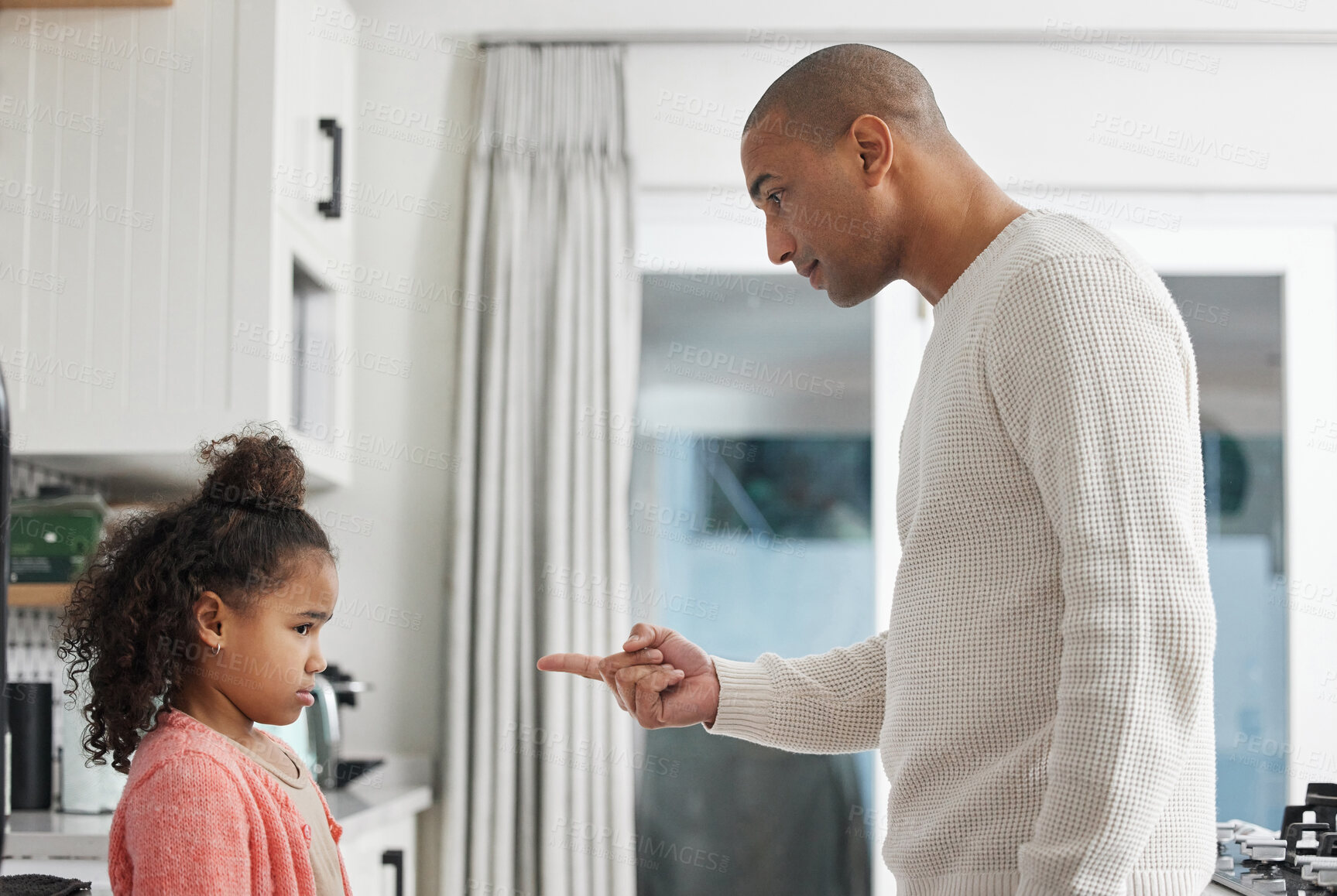 Buy stock photo Dad, girl and home with pointing finger for discipline or confrontation on bad behavior and mistake. People, parent and sad or disappointed with kid in kitchen 