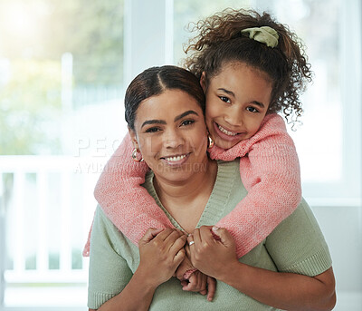 Buy stock photo Shot of an adorable little girl embracing her mother from behind