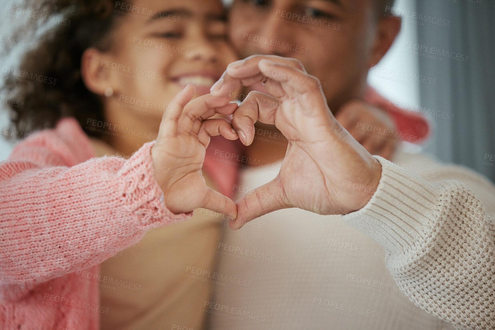 Buy stock photo Dad, girl and heart hands in home hug, sign and symbol of support in relationship for happiness. Father, daughter and emoji in family house for love, embrace and icon for thank you to parent for care