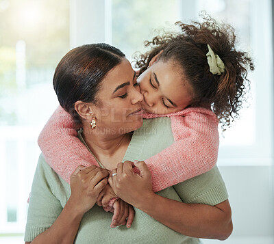 Buy stock photo Shot of an adorable little girl embracing her mother from behind