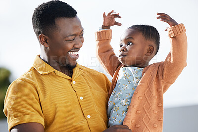 Buy stock photo Shot of a man spending time outdoors with his daughter