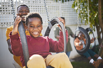 Buy stock photo Shot of a little boy having fun at the park with his family