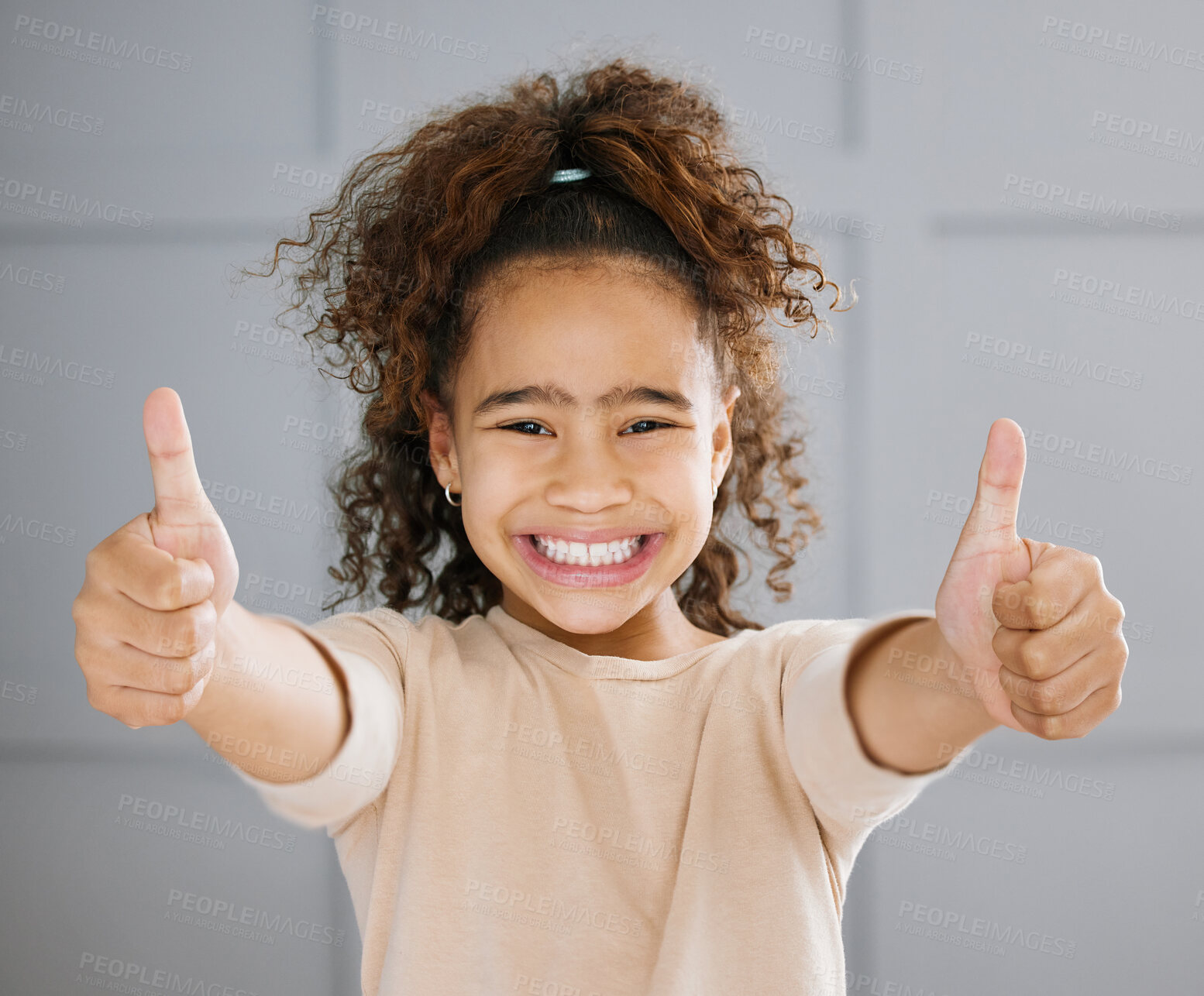 Buy stock photo Portrait, smile, and child with thumbs up at wall background for agreement, success and achievement for winner. Happy, girl and opinion with celebration, good news and emoji of announcement update