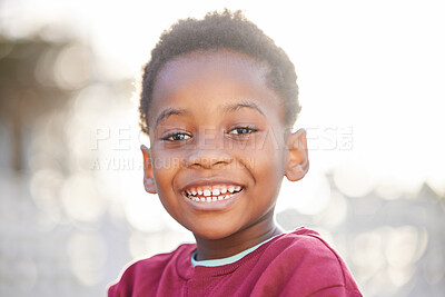 Buy stock photo Portrait, happy kid and face of black boy in park for games, freedom and weekend fun. Young child, smile or healthy on playground for growth, development or enjoying recess at kindergarten in Nigeria