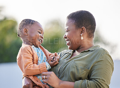 Buy stock photo Hug, family and mother with girl in park, happy and relax with childhood, bonding and having fun in nature or garden. Love, black woman and laughing child with parent smile for embrace in backyard