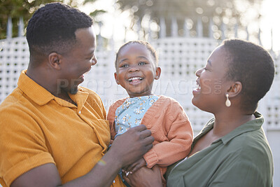 Buy stock photo Black family, laugh and relaxing parents in garden with mother, father and kids together with love. Happy, bonding and dad with mom and children with parent support and care in backyard for smile