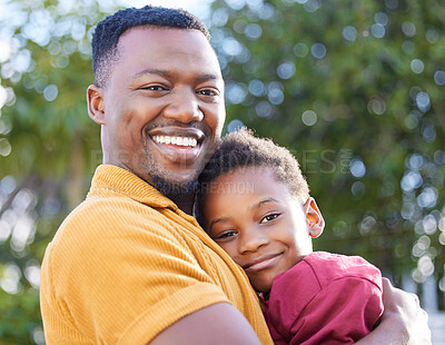 Buy stock photo Father, smile and black man hug kid for portrait, joy or happy bonding together in outdoor park. Family, child love and playing African people, son and papa embracing boy with game in backyard garden