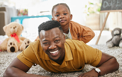 Buy stock photo Black man, teacher and kid with playing in kindergarten with toys for fun, education and child development. People, educator and happy on floor at school with support, care and help in day care