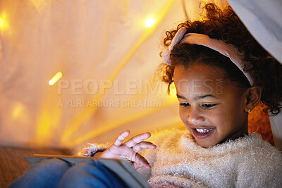 Buy stock photo Girl, child and tablet in home at night with playing educational games, ebook story and online scroll. Blanket fort, kid and digital app for streaming movie, watching cartoon and video entertainment