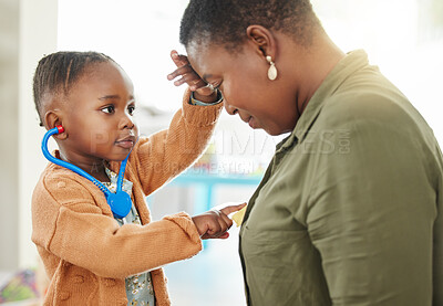 Buy stock photo Health, black girl playing doctor and mother with wellness, home and bonding with care, future and fun. Parent, daughter and female child with a stethoscope, game and medical with help and family