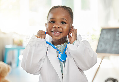 Buy stock photo Shot of a little girl playing dress up as a doctor