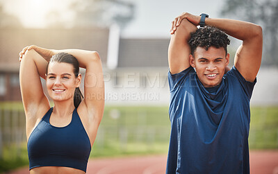 Buy stock photo Cropped portrait of two young athletes warming up while standing out on the track