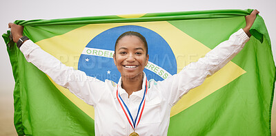 Buy stock photo Cropped portrait of an attractive young female athlete celebrating a victory for her country
