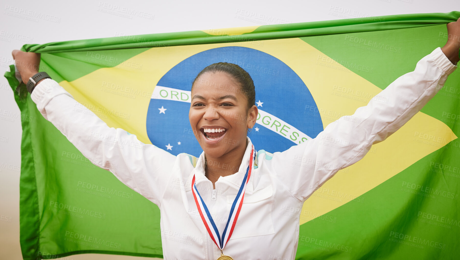 Buy stock photo Cropped portrait of an attractive young female athlete celebrating a victory for her country