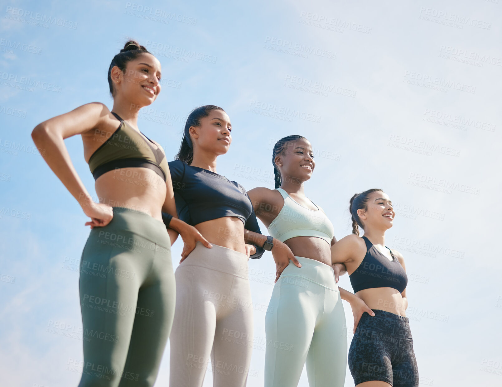 Buy stock photo Shot of a group of friends looking strong during a workout session