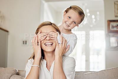 Buy stock photo Shot of a mother and daughter playing at home