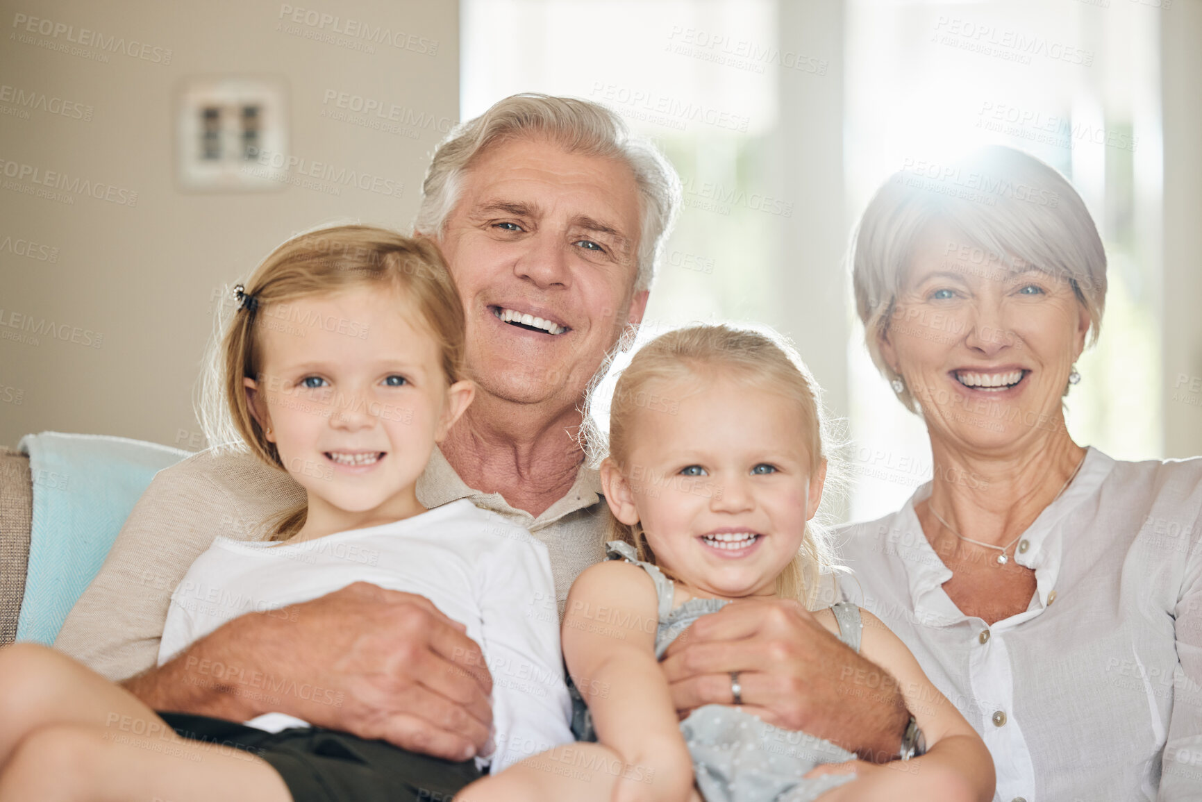 Buy stock photo Grandparents, grandchildren and happy in portrait on sofa in home with bonding, laughing and relax in living room. Family, people and babysitting on couch in lounge on weekend, excited and caring