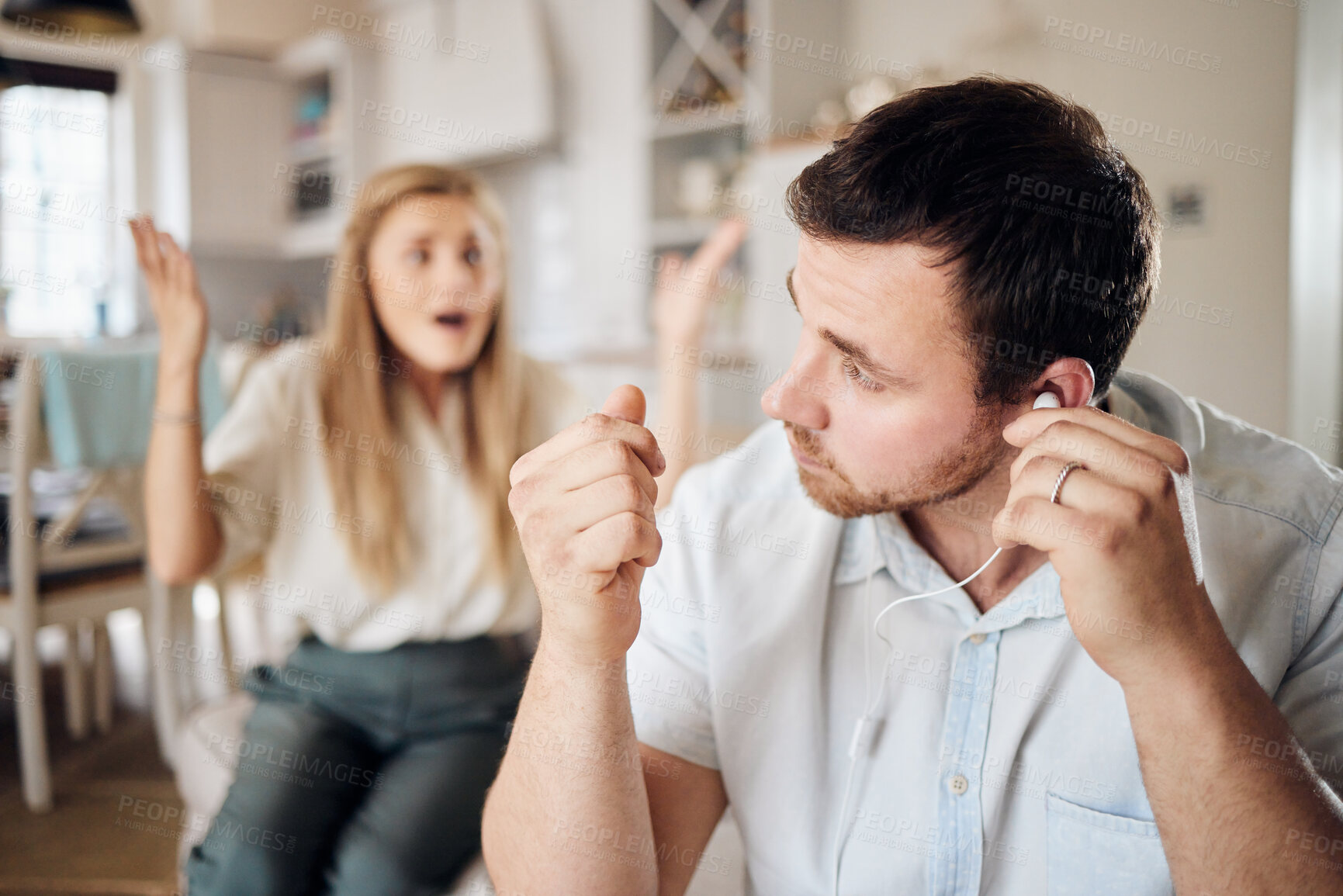 Buy stock photo Argument, ignore and couple in home for divorce, conflict and disagreement for marriage crisis. Listening to music, argue and frustrated man and woman for breakup, toxic relationship and affair