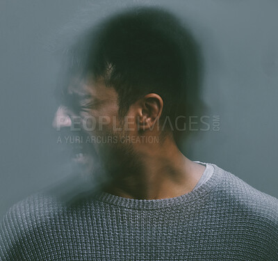 Buy stock photo Studio shot of a young man experiencing mental anguish and screaming