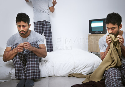 Buy stock photo Shot of a scared male sitting in a mental asylum