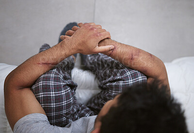 Buy stock photo Shot of a unrecognizable man sitting in a mental asylum