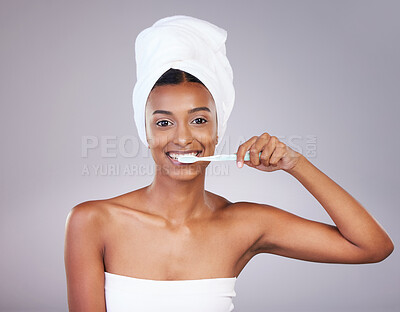 Buy stock photo Portrait, woman and toothbrush in studio for dental hygiene, wellness and oral care with toothpaste. Female person, face and mouth by white background for fluoride, cavities and germ protection