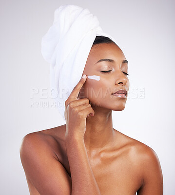 Buy stock photo Skincare, woman and cream for beauty, dermatology and routine facial treatment. Spa, wellness and skin glow aesthetic on white studio background with black model, cosmetics and luxury collagen shine