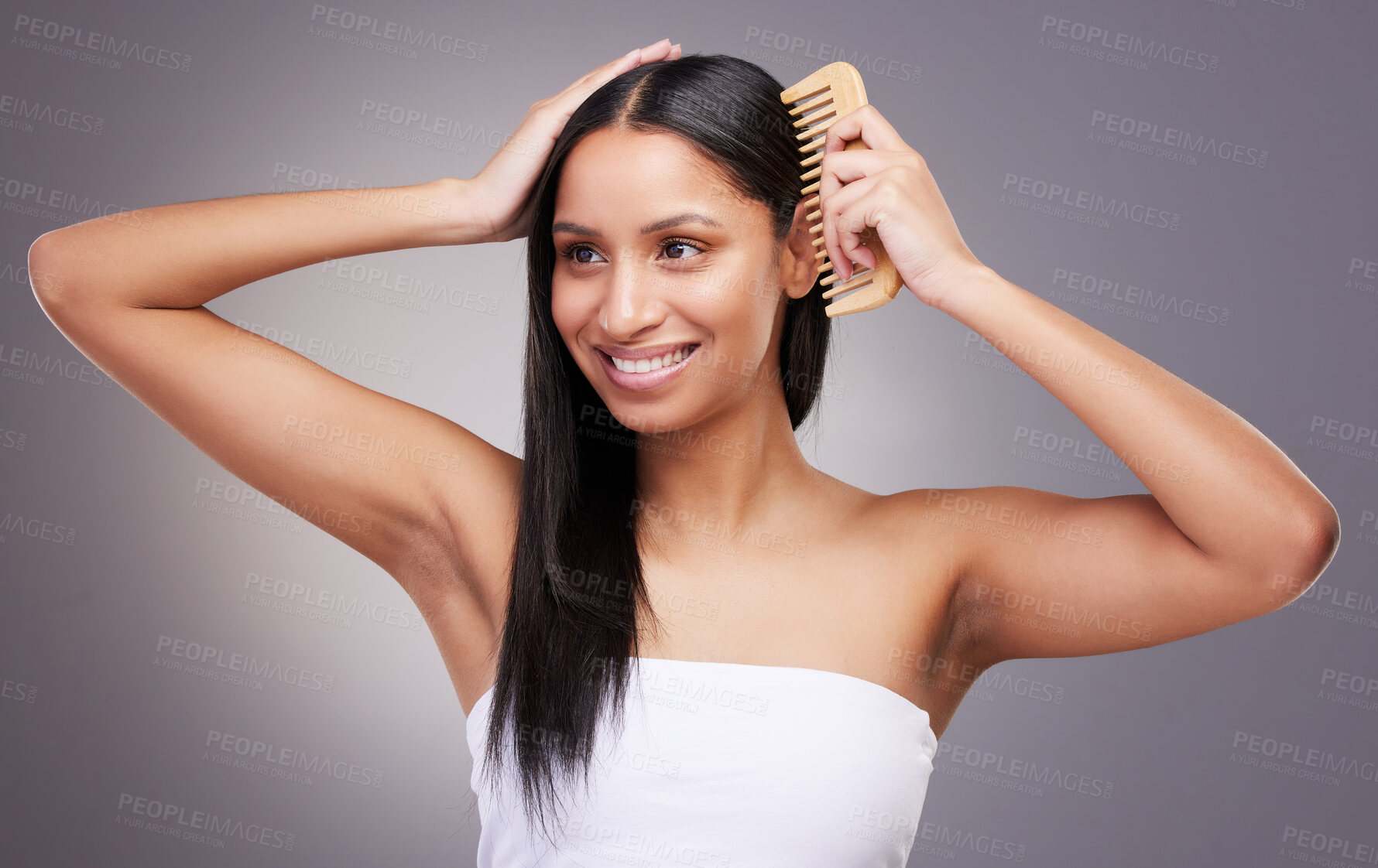 Buy stock photo Hair care, thinking and woman in studio with comb for grooming, scalp treatment or keratin on gray background. Hairstyle, brushing and hands of model for satisfaction, cosmetics or salon shine