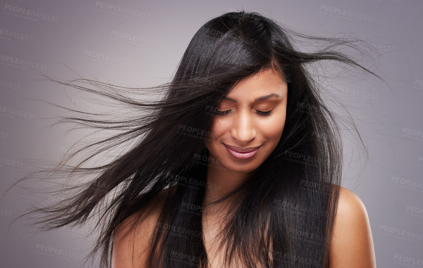 Buy stock photo Hair care, wind and woman in studio with eyes closed for keratin treatment, shampoo or cosmetics on gray background. Hairstyle, body and model with beauty for satisfaction, growth or collagen shine