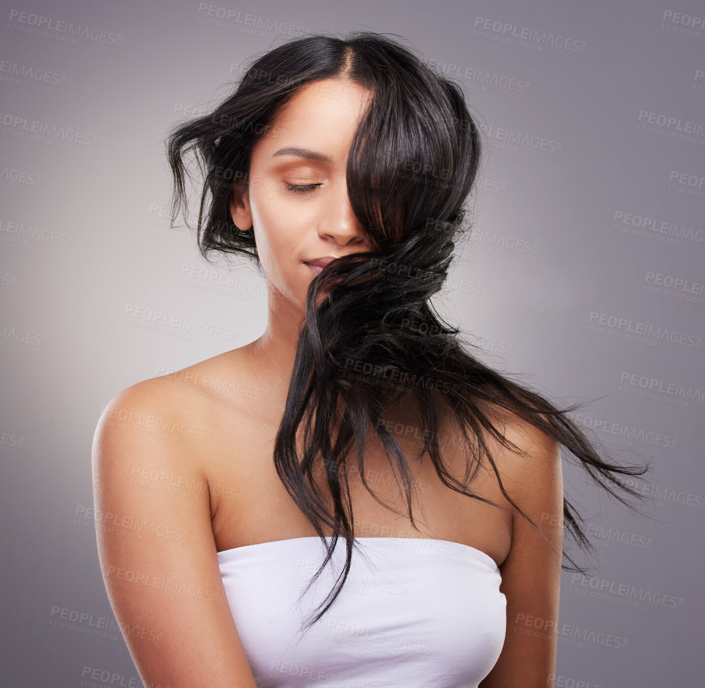 Buy stock photo Beauty, hair shake and woman with healthy scalp for shine results, growth and salon grooming for care in studio. Texture, model girl and hairstyle flip with luxury spa aesthetic by grey background