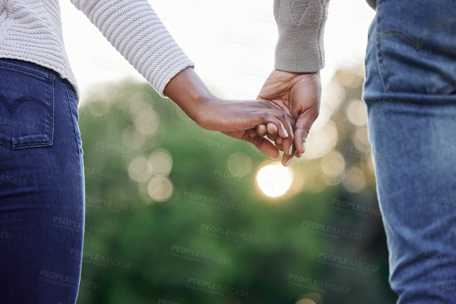 Buy stock photo Travel, closeup and couple holding hands at park for anniversary date, trust or honeymoon romance. Wellness, vacation trip and people in nature with support, care and love on holiday break in garden