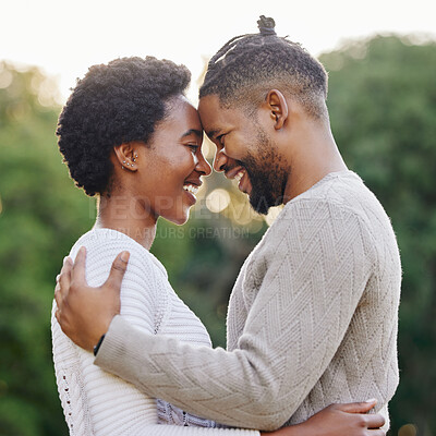 Buy stock photo Hug, love and happy black couple at park for anniversary date or honeymoon romance with smile. Forehead touch, eye contact and people in nature with support, care and trust on holiday or garden