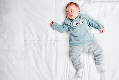 Buy stock photo Peace, top view and baby boy on bed for sleeping, dream and resting in at home with milk bottle after feeding. Calm, relax or kid asleep in bedroom with safety, comfort and child development in house