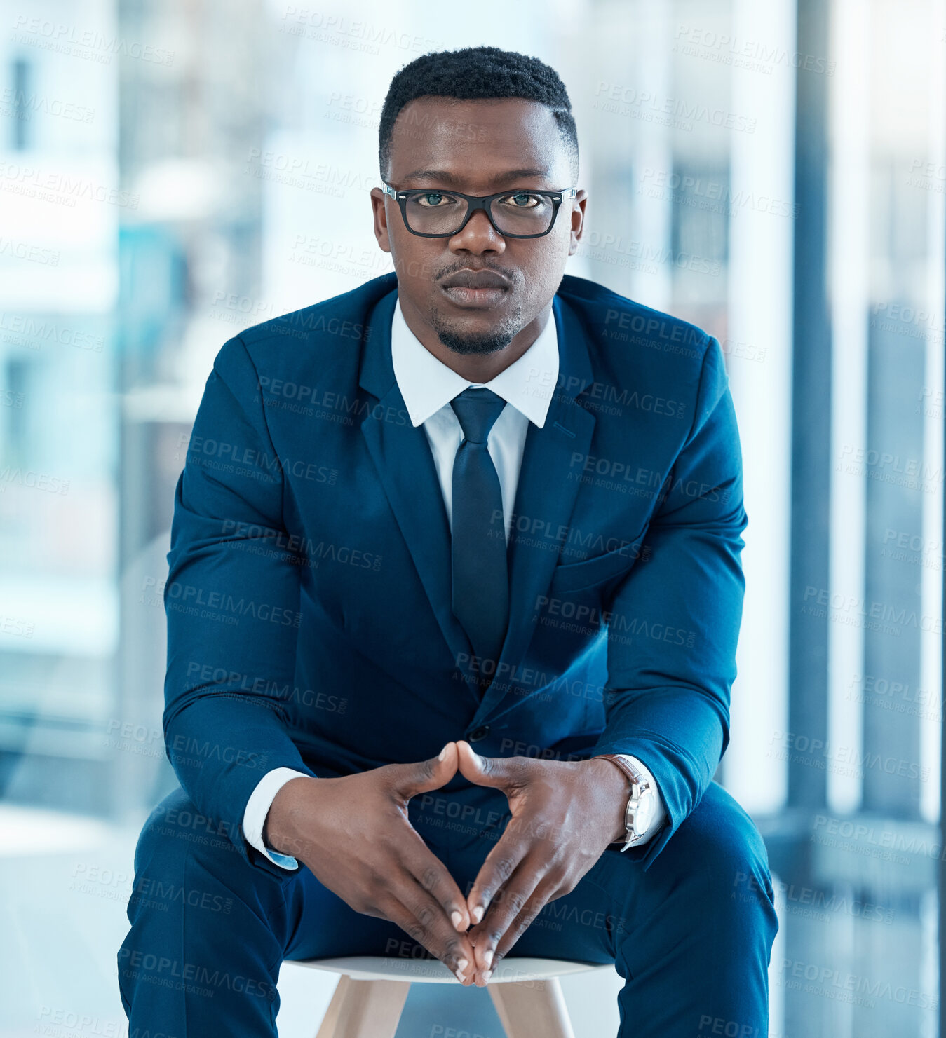 Buy stock photo Portrait, businessman and sitting in office with glasses, professional and corporate company. Financial manager, hands and serious in workplace for project, investment and goals for organisation