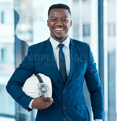 Buy stock photo Portrait, businessman and construction hat for career, building company and pride or excited in office. African male person, architect and real estate in workplace or enterprise for new project 