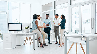 Buy stock photo Shot of a group of businesspeople having a meeting in a modern office at work