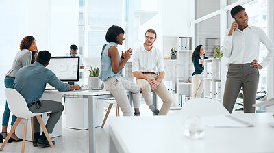 Buy stock photo Shot of a group of businesspeople working in a modern office at work
