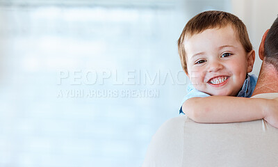 Buy stock photo Shot of a father carrying his son at home