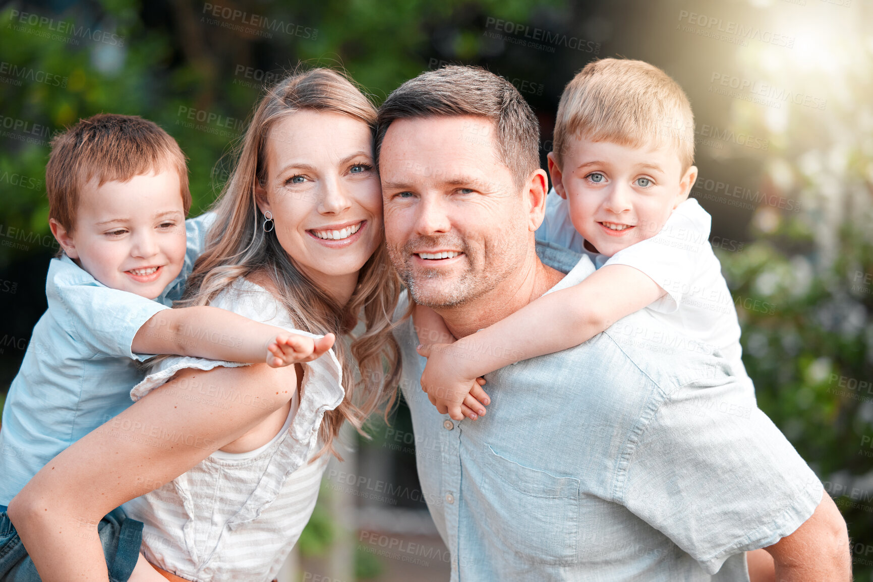 Buy stock photo Piggyback, child and happy family in outside portrait together, parents and boy in garden for bonding on weekend break. Summer, love and smile or care on holiday, nature trees and support in backyard