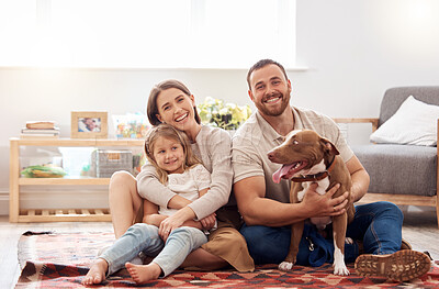 Buy stock photo Mom, dad and portrait of kid with dog in living room for quality time, love and care together at home. Mother, father and happy family with child, pet pitbull and relax for happiness on carpet floor