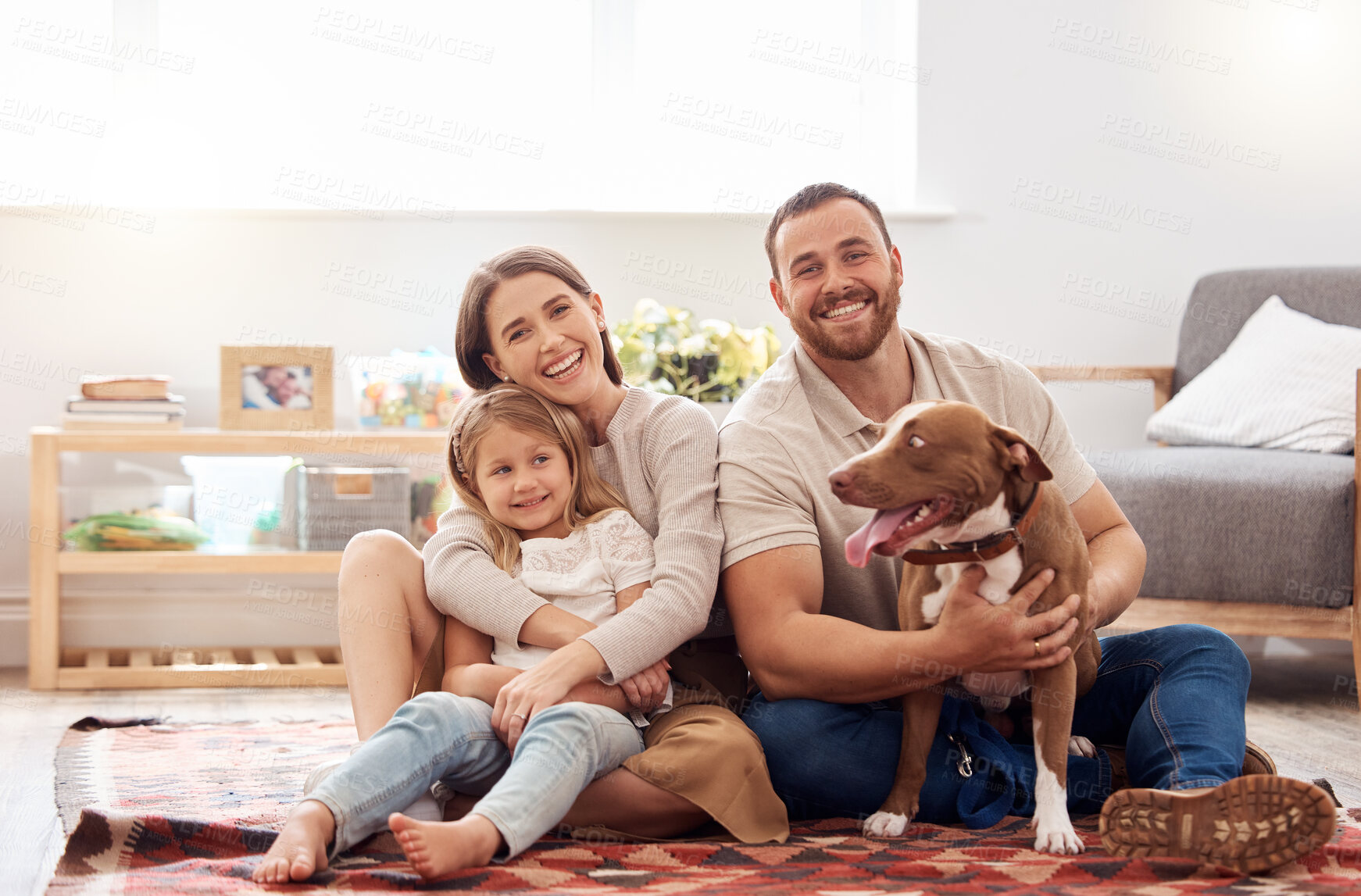 Buy stock photo Mom, dad and portrait of kid with dog in living room for quality time, love and care together at home. Mother, father and happy family with child, pet pitbull and relax for happiness on carpet floor