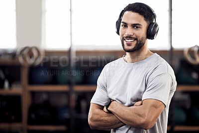 Buy stock photo Headphones, fitness and man listening to music at gym for exercise or training workout. Face portrait of happy male athlete listen to audio sound with tech for motivation, mindset and space to relax