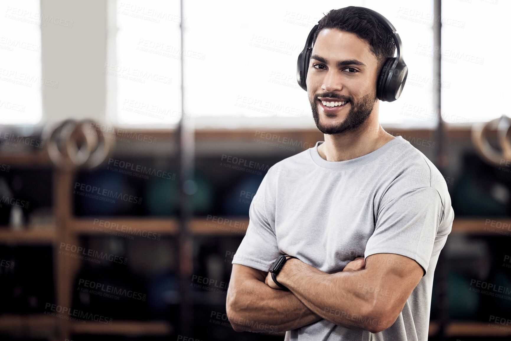 Buy stock photo Headphones, fitness and man listening to music at gym for exercise or training workout. Face portrait of happy male athlete listen to audio sound with tech for motivation, mindset and space to relax