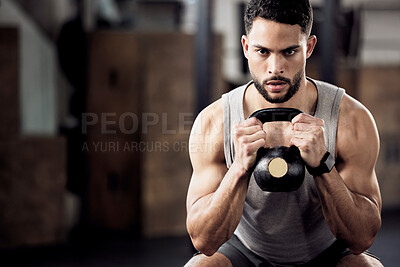 Buy stock photo Fitness, exercise and man squat with a kettlebell at gym for a training workout with focus. Serious male athlete or bodybuilder with weights for strong muscle, power and motivation with mockup space