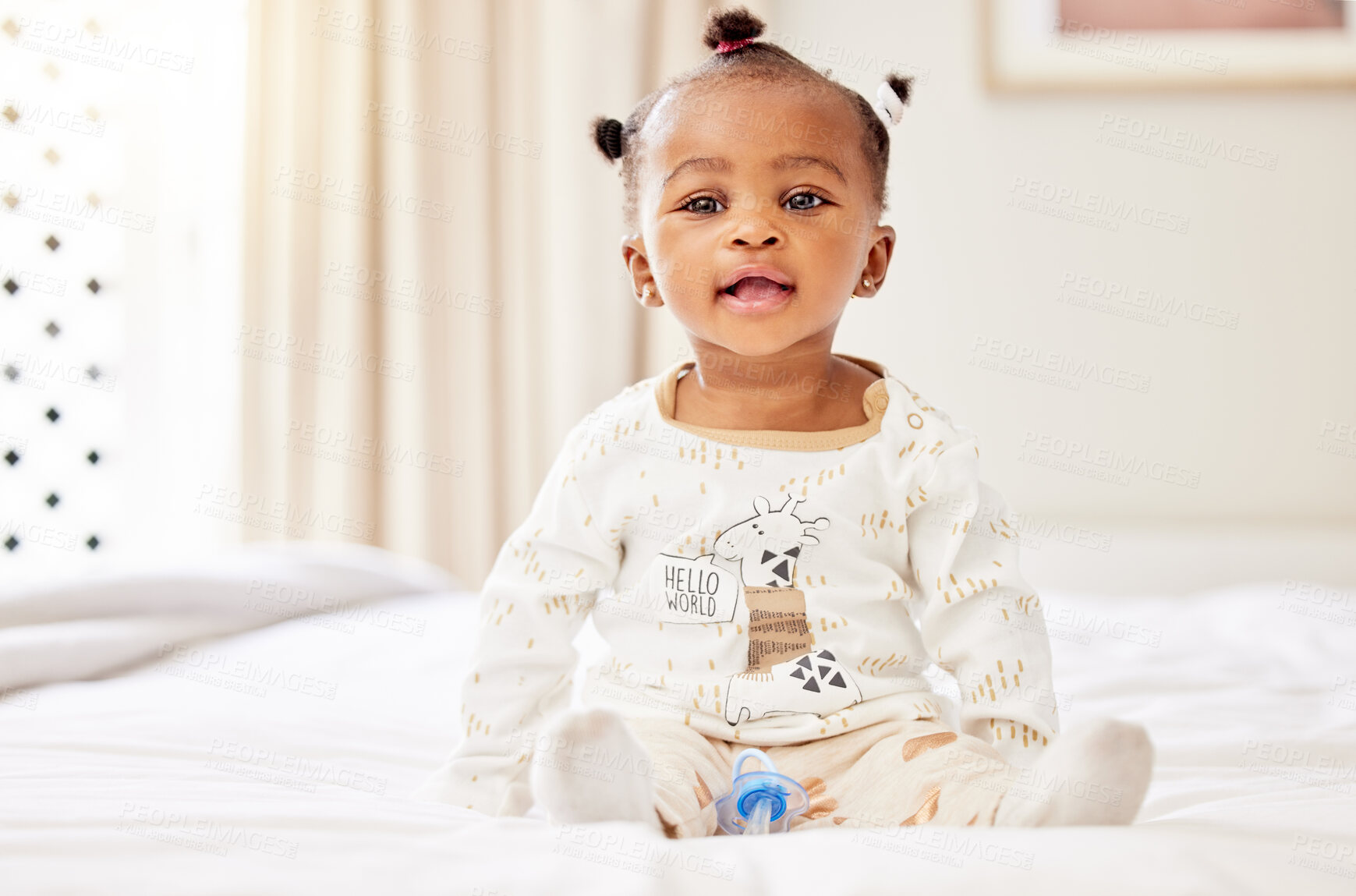 Buy stock photo Black girl, smile and cute baby on bed for healthy growth with pacifier, calm and relax in home. Happy, African newborn and female child on mattress for morning, development and wake up from nap