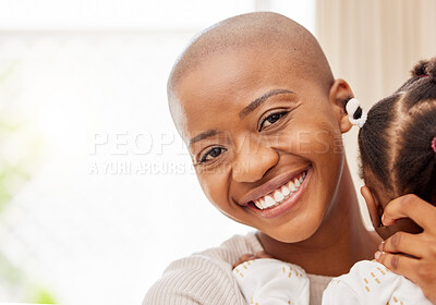 Buy stock photo Portrait of a mother bonding with her baby daughter at home