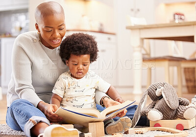 Buy stock photo Shot of a young mother and daughter playing in the lounge at home