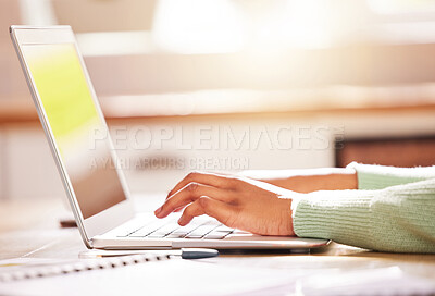 Buy stock photo Shot of a woman using her laptop while working from home
