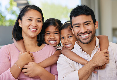 Buy stock photo Smile, hug and portrait of family on sofa in living room for care, love and bonding together. Happiness, parents and girl children embrace on couch for relax, having fun or affection in home