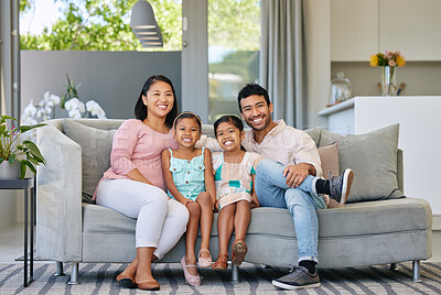 Buy stock photo Portrait, happiness and asian family on couch in living room for weekend, relax and pride for new apartment. Mother, father and children on sofa for bonding, love and smiling with  smile in home 